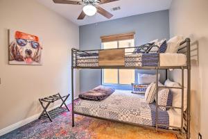 a bedroom with two bunk beds in a room at Lavish Escape with Pool 1 Mi to Old Town La Quinta! in La Quinta