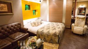 Katil atau katil-katil dalam bilik di Restay SaKuRa (Adult Only)