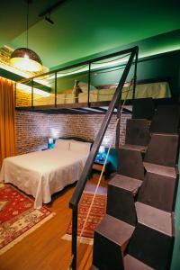 Postel nebo postele na pokoji v ubytování Cathedral Boutique Hotel