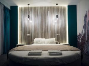 Posteľ alebo postele v izbe v ubytovaní Art Hotel Palma