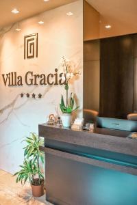 a lobby with a sign that reads villa gracia at Hotel Villa Gracia in Budva