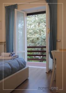 Postel nebo postele na pokoji v ubytování Momentoroma b&b + 23 fotografií