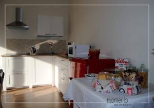 Kuchyň nebo kuchyňský kout v ubytování Momentoroma b&b