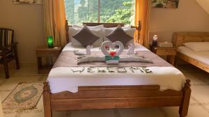 Postel nebo postele na pokoji v ubytování Mountain Lodge