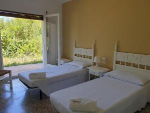 Giường trong phòng chung tại El Mirador Apartamento dúplex 3 hab con vistas excepcionales S1