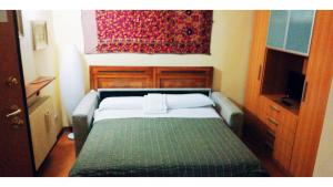 Posteľ alebo postele v izbe v ubytovaní Booking San Marco Apartment