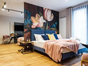 Łóżko lub łóżka w pokoju w obiekcie Aparthotel Inspire Miodova Residence