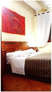 Posteľ alebo postele v izbe v ubytovaní Booking San Marco Apartment