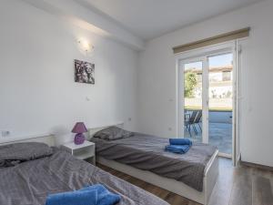 Postel nebo postele na pokoji v ubytování Apartment Monika with private pool in Porec