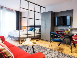 Łóżko lub łóżka w pokoju w obiekcie Aparthotel Inspire Miodova Residence