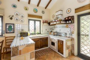 Kuchyň nebo kuchyňský kout v ubytování Casa Nel Vigneto