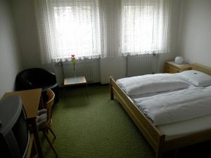 Postel nebo postele na pokoji v ubytování Landgasthof Wellmann