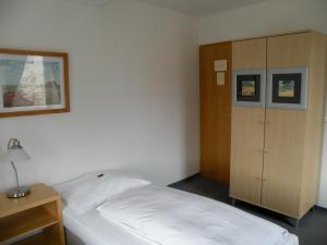 Postel nebo postele na pokoji v ubytování Landgasthof Wellmann