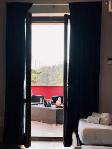 A bed or beds in a room at Hotel Eremo