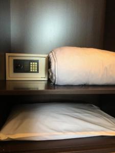 A bed or beds in a room at Hotel Eremo
