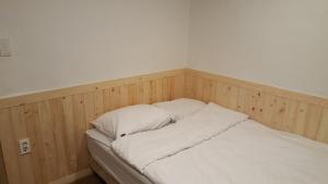 Ένα ή περισσότερα κρεβάτια σε δωμάτιο στο Dadareum Guesthouse