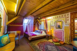 Un pat sau paturi într-o cameră la Janus Boutique Hotel & Spa