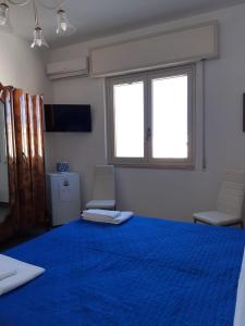 Letto o letti in una camera di Le Quattro Isole
