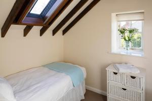 Morton House and The Stable Block Masham - Adjoining holiday cottages for singles, couples and large groups客房内的一张或多张床位