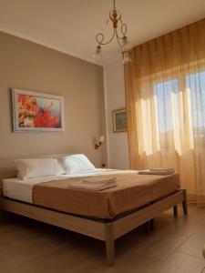 Letto o letti in una camera di Le Quattro Isole