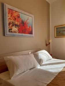 Letto o letti in una camera di Le Quattro Isole