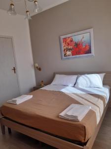 Letto o letti in una camera di Le Quattro Isole