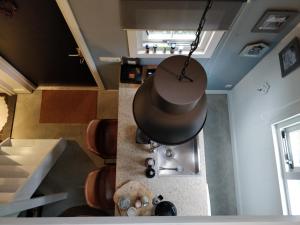 a view of the living room of a tiny house at 't Hofhuys Oss in Oss +18 photos