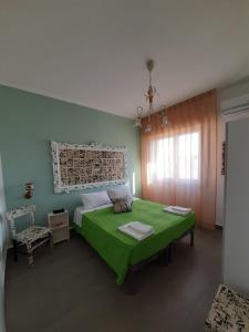 Letto o letti in una camera di Le Quattro Isole