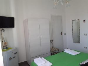 Letto o letti in una camera di Le Quattro Isole
