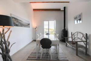 A seating area at CAPO BIANCO - Cap Corse et Vue Mer