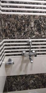 Vannituba majutusasutuses C N Comforts Hotel & Dormitory