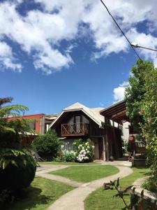 Aed väljaspool majutusasutust Hostal & Cabañas Don Juan