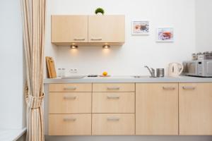 Kuchyň nebo kuchyňský kout v ubytování Apartments Warsaw Warecka by Noclegi Renters