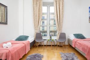 Postel nebo postele na pokoji v ubytování Apartments Warsaw Warecka by Noclegi Renters + 13 fotografií