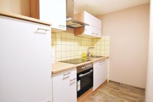 Küche/Küchenzeile in der Unterkunft Apartment Köln Porz