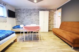 Ein Sitzbereich in der Unterkunft Apartment Köln Porz