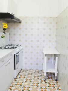 Kuchyň nebo kuchyňský kout v ubytování B&B Linae - Residence