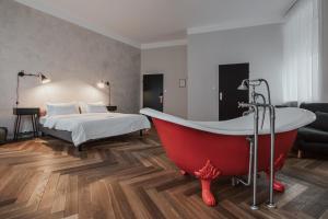 Letto o letti in una camera di Hotel Babula am Augarten