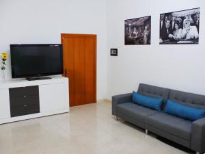 TV a/nebo společenská místnost v ubytování B&B Linae - Residence