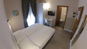 Katil atau katil-katil dalam bilik di Hotel Alberello