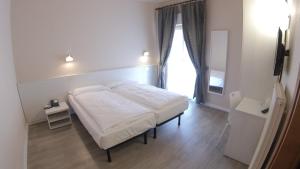 Katil atau katil-katil dalam bilik di Hotel Alberello