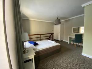 Posteľ alebo postele v izbe v ubytovaní CIENISTA 7 APARTMENTS