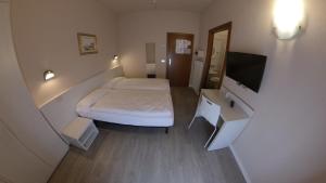Katil atau katil-katil dalam bilik di Hotel Alberello