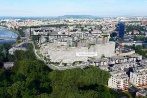 une vue aérienne sur une ville avec des bâtiments dans l'établissement Wislane Tarasy 2.0 by Atrium Apartments, à Cracovie