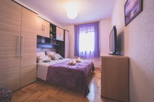 Posteľ alebo postele v izbe v ubytovaní Family House Nino