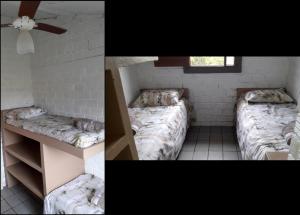 a room with two beds and a ceiling fan at Casa na Ilha da Croa in Barra de Santo Antônio