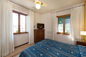 Posteľ alebo postele v izbe v ubytovaní Hotel Corallo