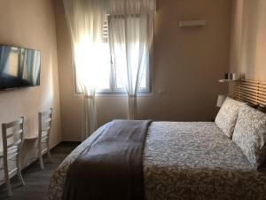 Postel nebo postele na pokoji v ubytování Hayloft