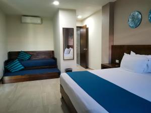 Postel nebo postele na pokoji v ubytování Hotel Pabela + 27 fotografií