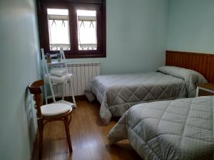Postel nebo postele na pokoji v ubytování Apartamento Laera